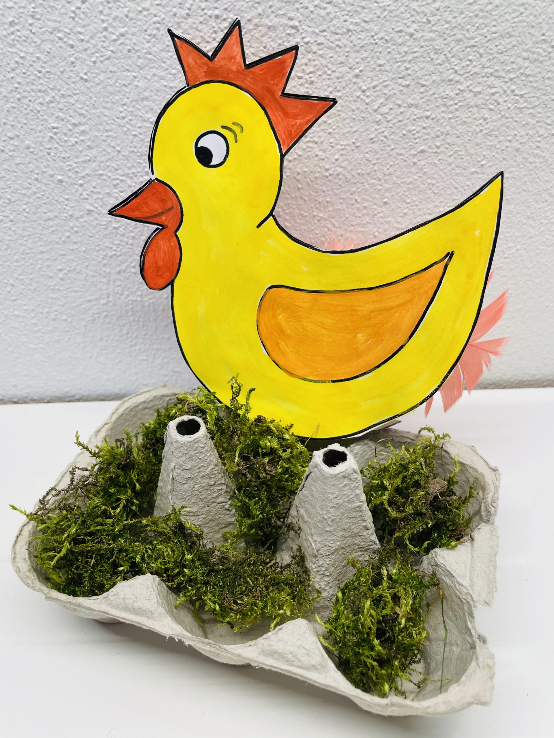 Bild zum Schritt 18 für das Bastel- und DIY-Abenteuer für Kinder: 'Dekoriert das Nest mit etwas frischem oder getrockneten Moos.'