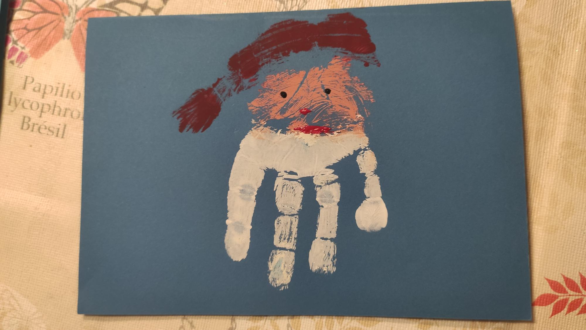 Bild zum Schritt 11 für das Bastel- und DIY-Abenteuer für Kinder: 'Fertig ist die Nikolauskarte oder Weihnachtsmannkarte.  Jetzt legt ihr...'