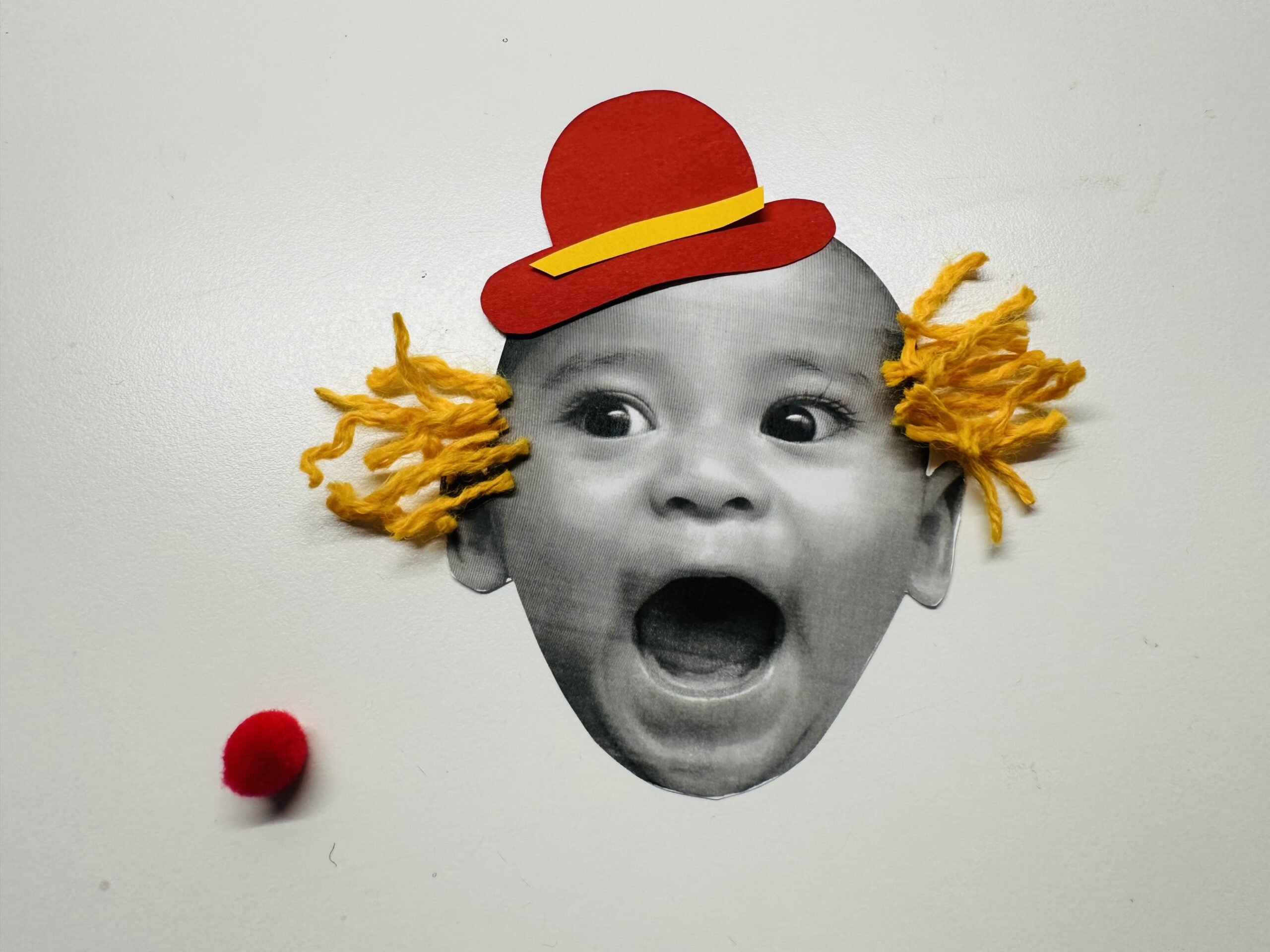 Bild zum Schritt 7 für das Bastel- und DIY-Abenteuer für Kinder: 'Die Haare und den Hut erst zurecht legen, und wenn...'