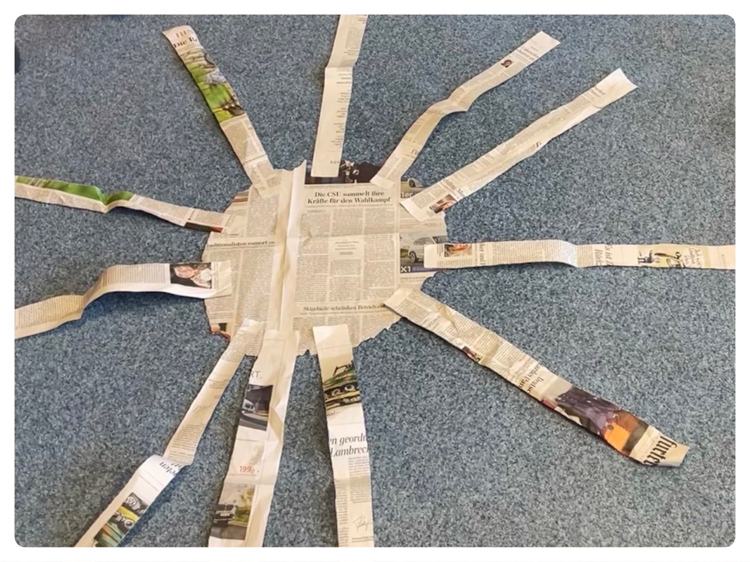Titelbild zur Bastel- und DIY-Idee für Kinder '(897) Sonne aus Zeitungspapier'